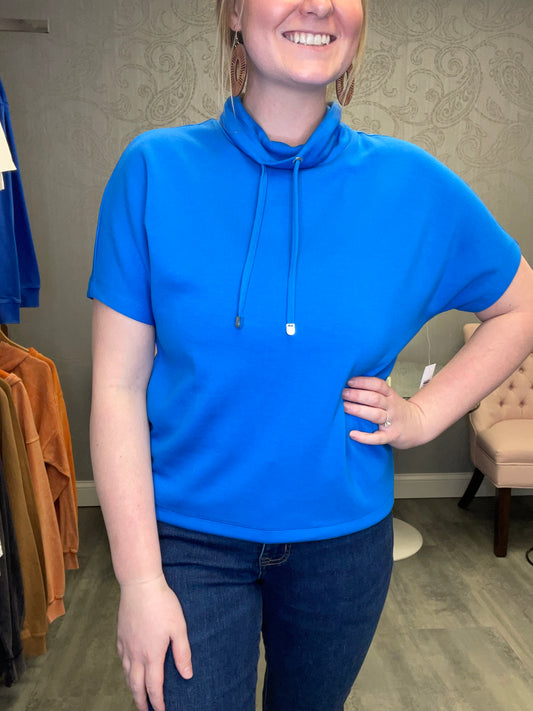 TRIBAL: FUNNEL NECK TOP W DRAWSTRING